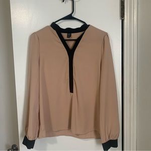 Womens medium tan blouse with black trim. Never worn